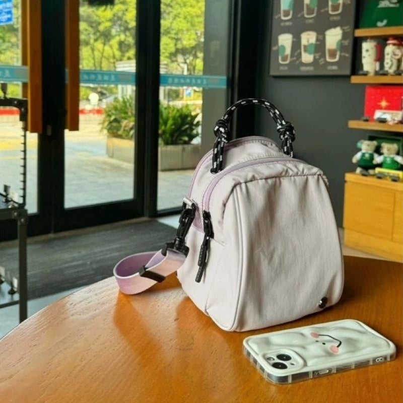 One Unique Shell-Shaped Backpack Designed for Casual Sports Use, Perfect for Daily Commutes, School, Or Travel. It Features Comfortable Straps And Is Part of The Spring Collection