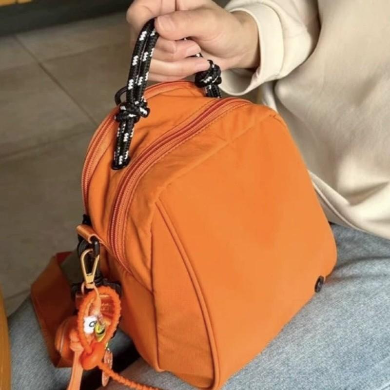 One Unique Shell-Shaped Backpack Designed for Casual Sports Use, Perfect for Daily Commutes, School, Or Travel. It Features Comfortable Straps And Is Part of The Spring Collection