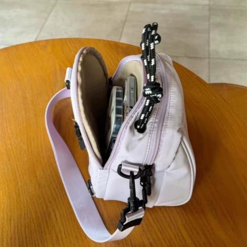 One Unique Shell-Shaped Backpack Designed for Casual Sports Use, Perfect for Daily Commutes, School, Or Travel. It Features Comfortable Straps And Is Part of The Spring Collection