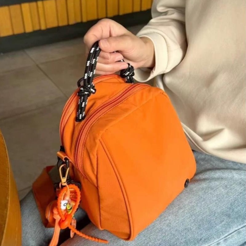 One Unique Shell-Shaped Backpack Designed for Casual Sports Use, Perfect for Daily Commutes, School, Or Travel. It Features Comfortable Straps And Is Part of The Spring Collection